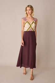 Abito lungo con corpetto a fiori