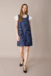 Denim dress with sequin flowers