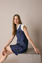 Denim dress with sequin flowers