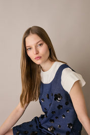 Denim dress with sequin flowers