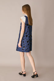 Denim dress with sequin flowers
