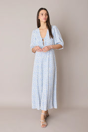 Abito lungo in fantasia con scollo a V