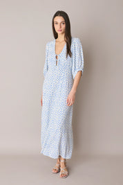 Abito lungo in fantasia con scollo a V