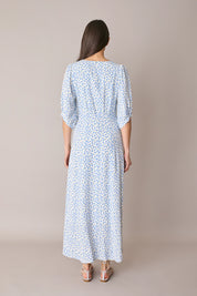 Abito lungo in fantasia con scollo a V