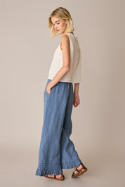Pantaloni in lino con volant