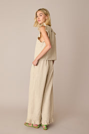 Pantaloni in lino con volant