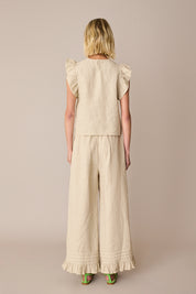 Pantaloni in lino con volant
