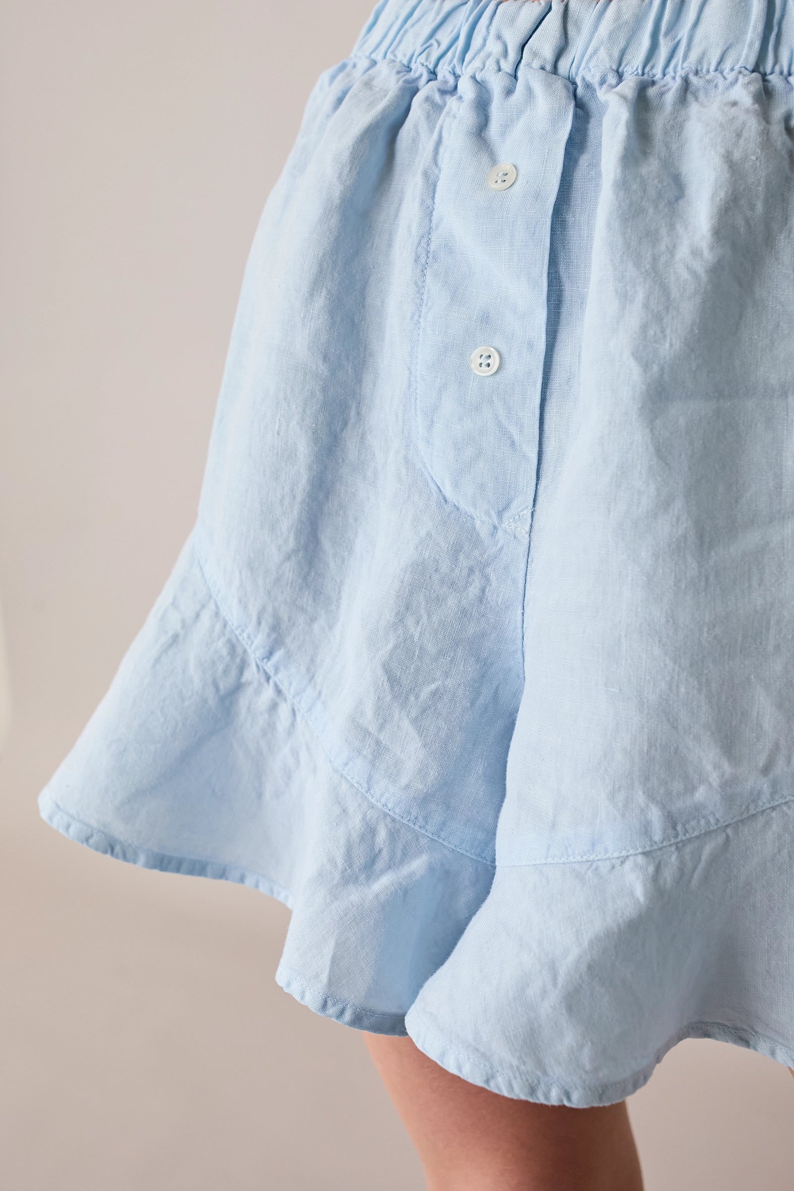 Shorts in lino con bottoni