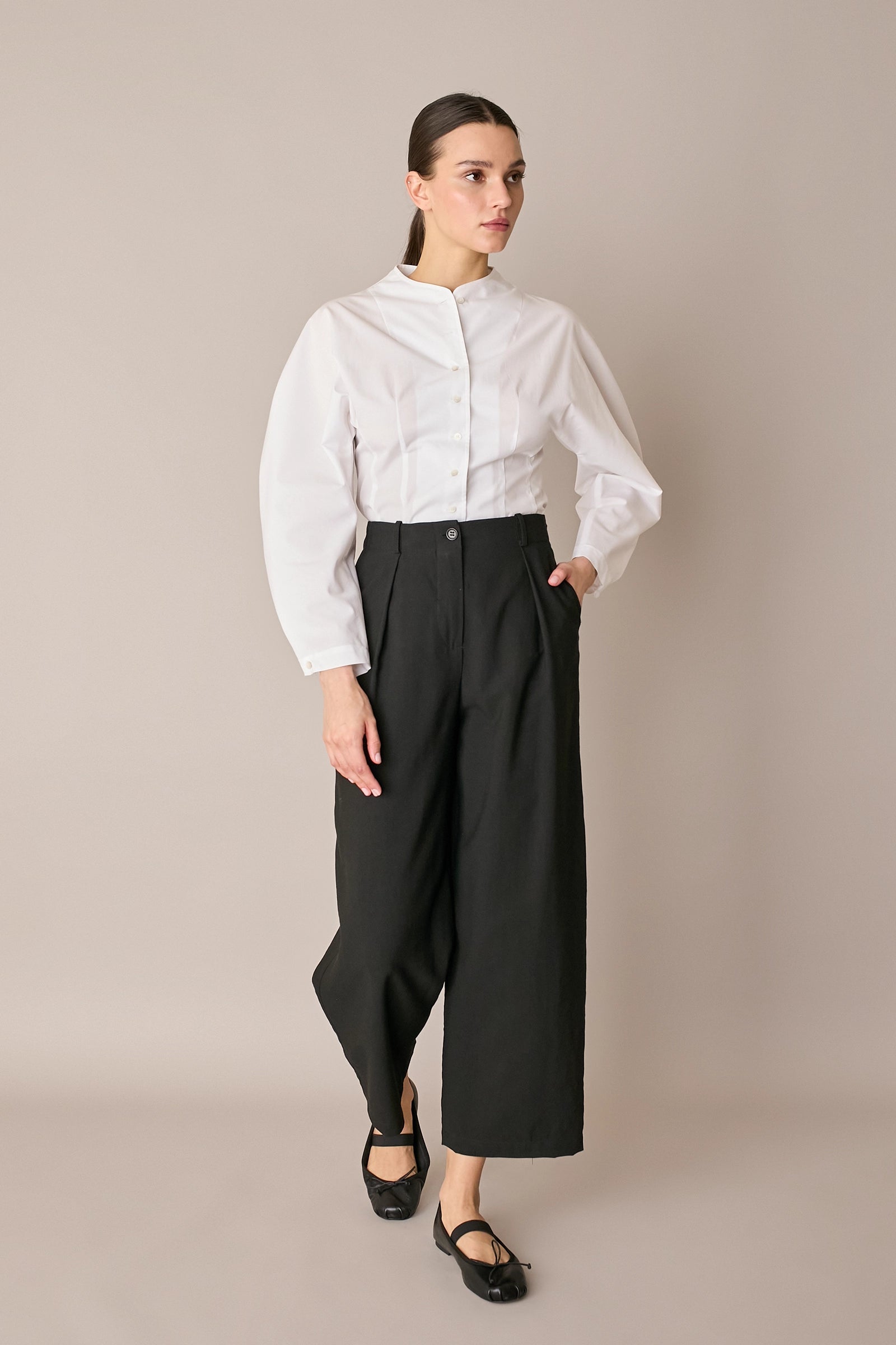 Pantaloni fluidi con pinces