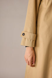Trench con colletto volant