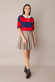 Gonna corta a pieghe