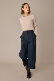 Pantaloni con piega e risvolto