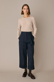 Pantaloni con piega e risvolto