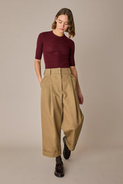 Pantaloni con piega e risvolto