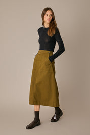 Gonna midi con tasche applicate