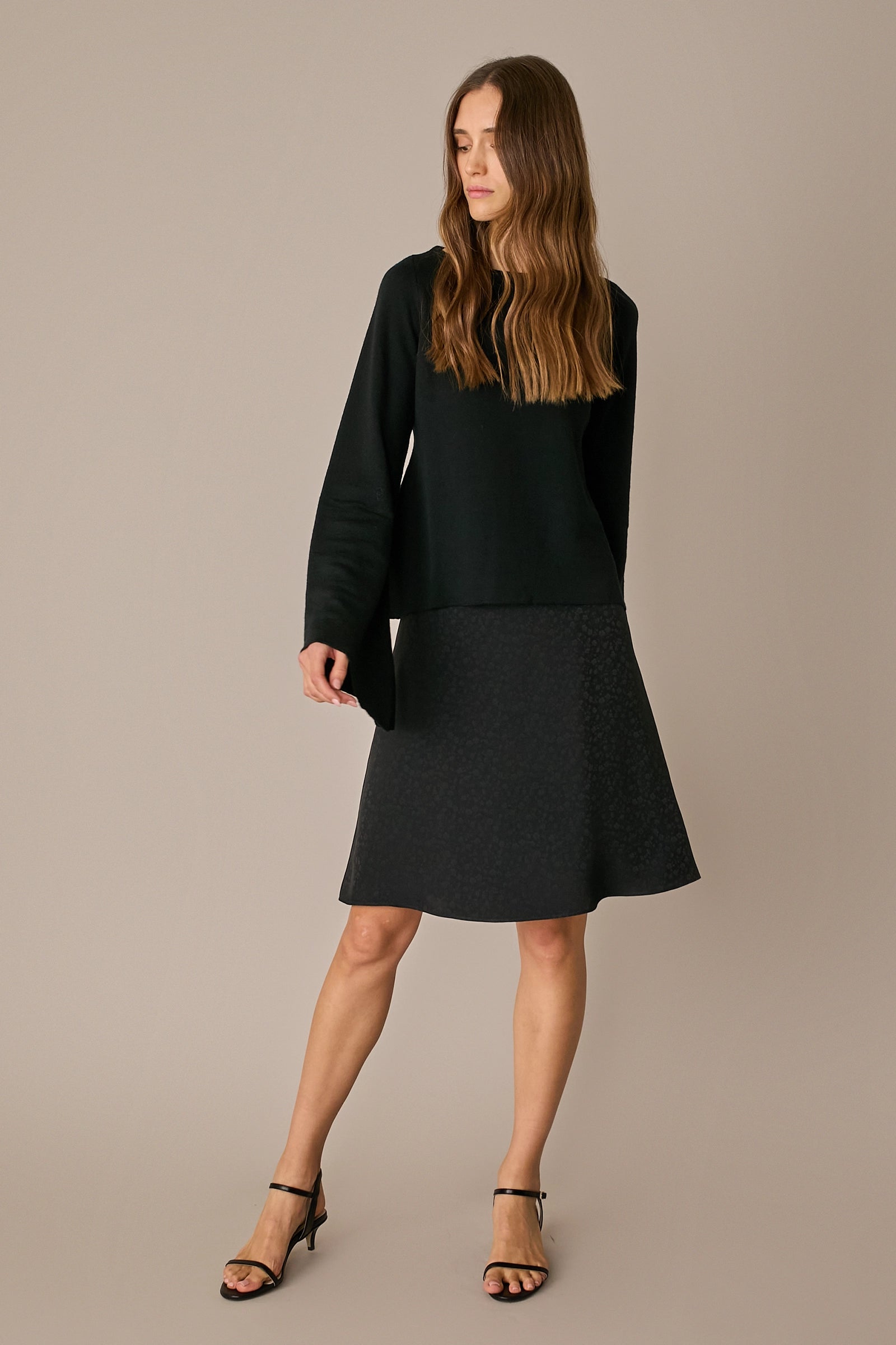 Gonna fluida jacquard