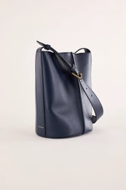 Leather bucket bag with strap