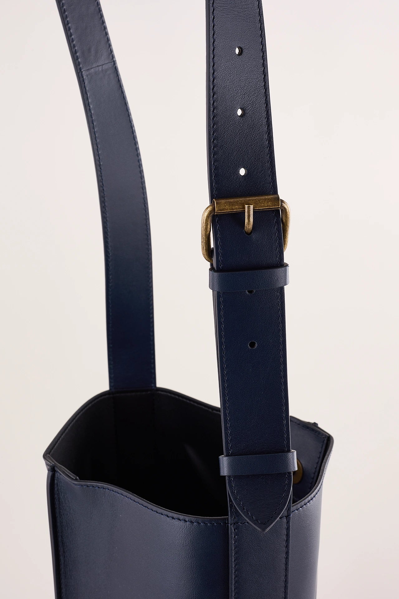 Leather bucket bag with strap