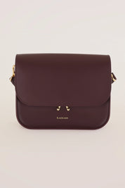 Rectangular shoulder bag with push-lock fastening