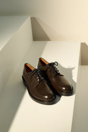 Stringate in pelle liscia
