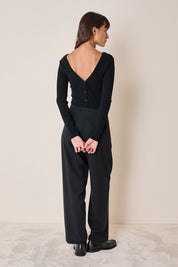 Pullover con scollo a V sulla schiena