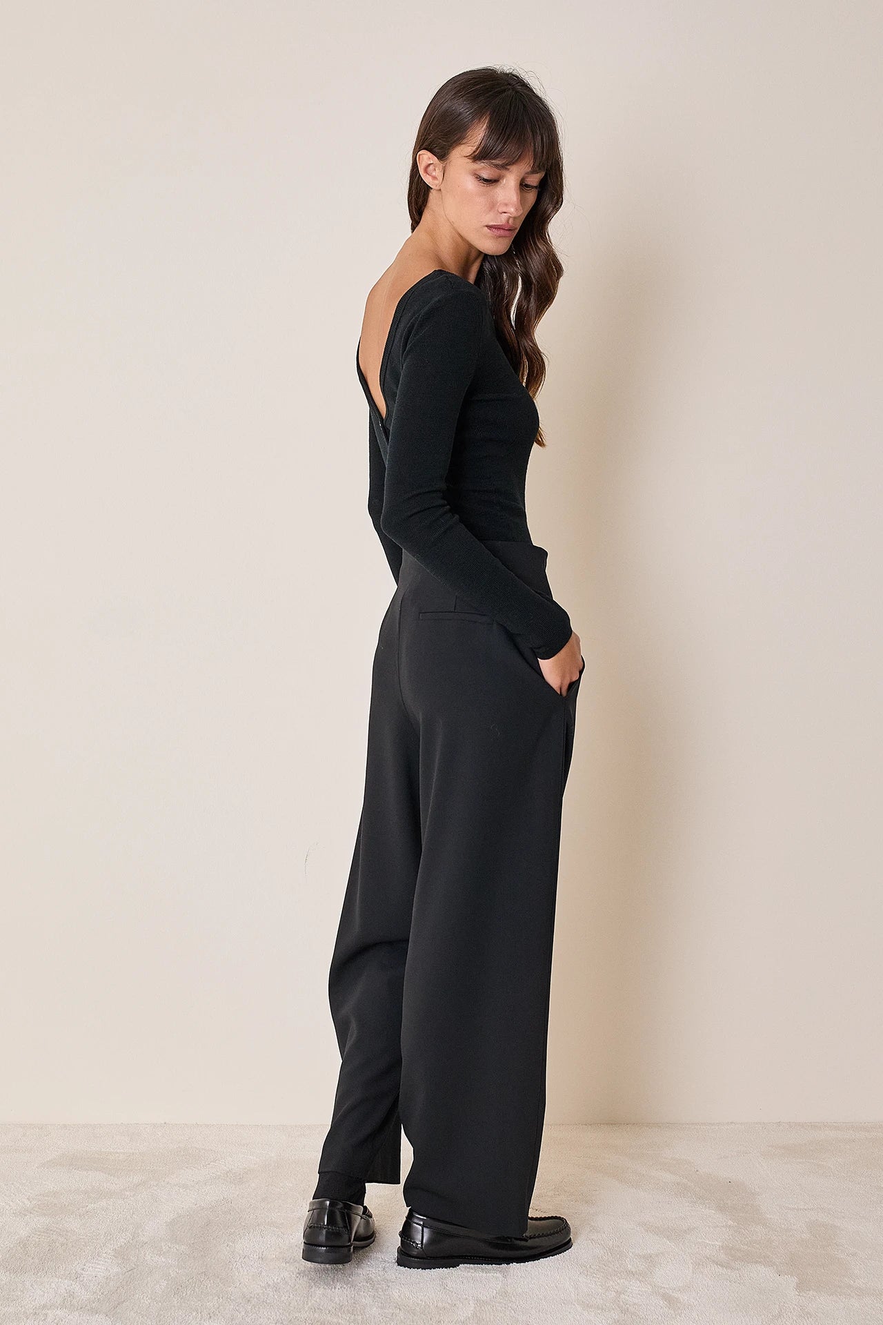 Pullover con scollo a V sulla schiena