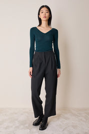 Pullover con scollo a V sulla schiena