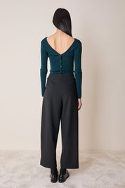 Pullover con scollo a V sulla schiena