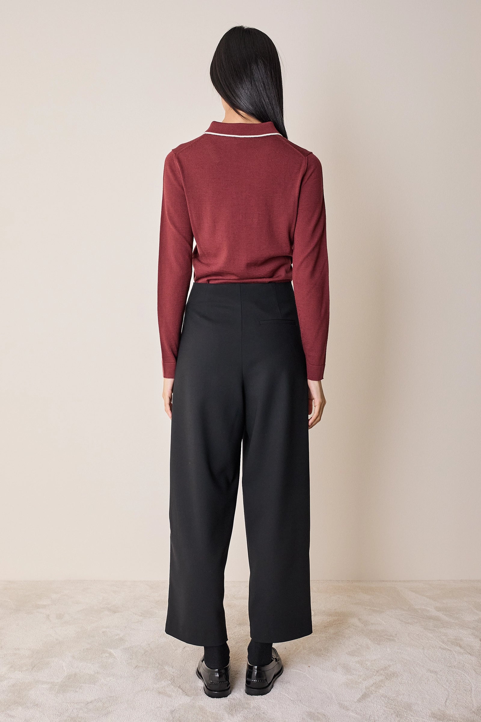 Polo shirt with ruffles and ball buttons