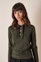 Polo shirt with ruffles and ball buttons