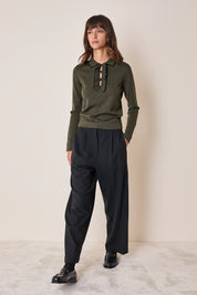 Polo shirt with ruffles and ball buttons