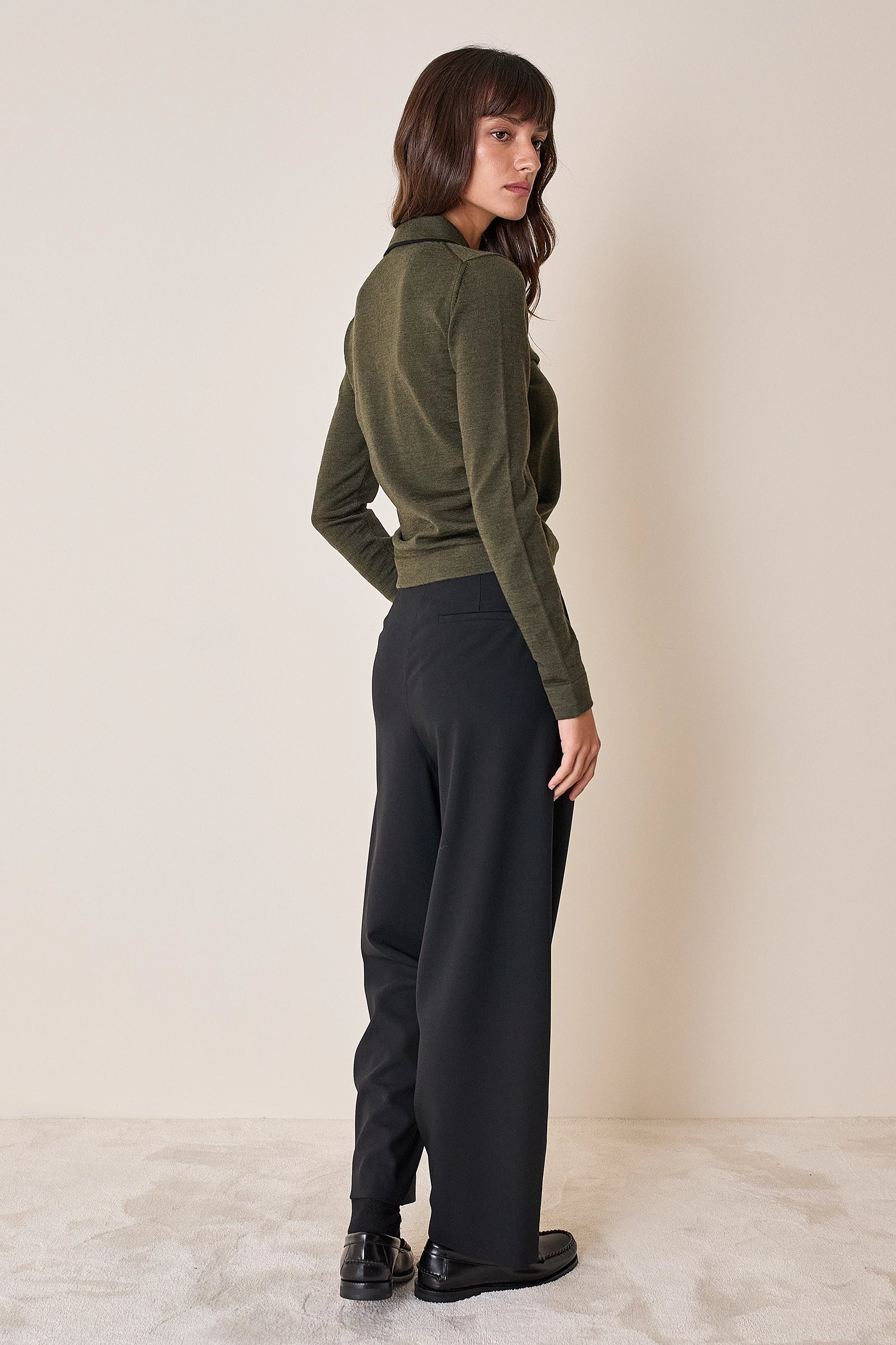 Polo shirt with ruffles and ball buttons