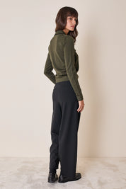 Polo shirt with ruffles and ball buttons