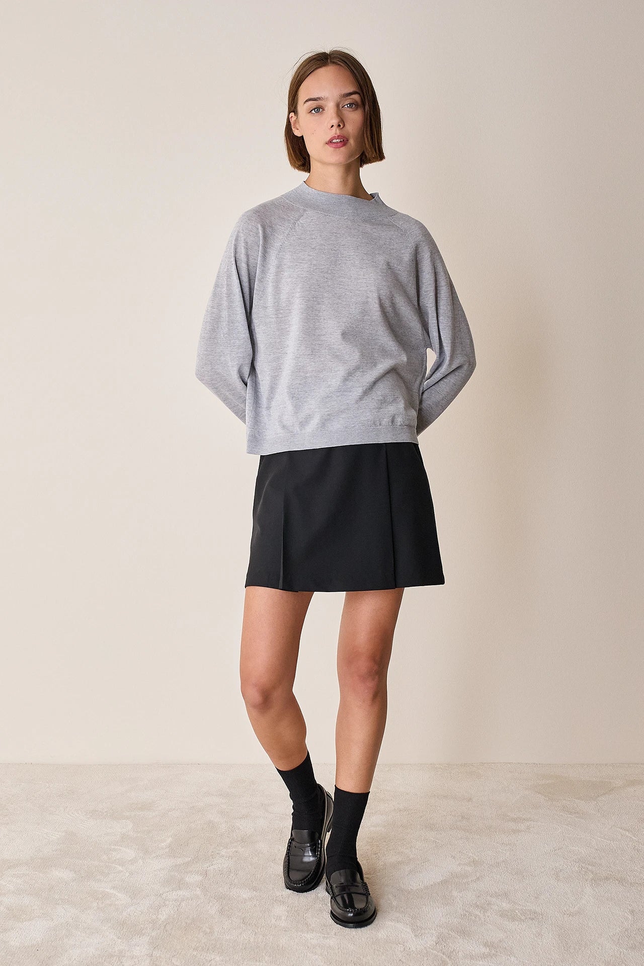 Maglia con collo alto in lana merino