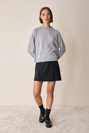 Maglia con collo alto in lana merino