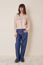 Maglia in alpaca con bordi smerlati