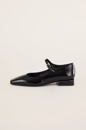 Ballerine in pelle lucida con cinturino