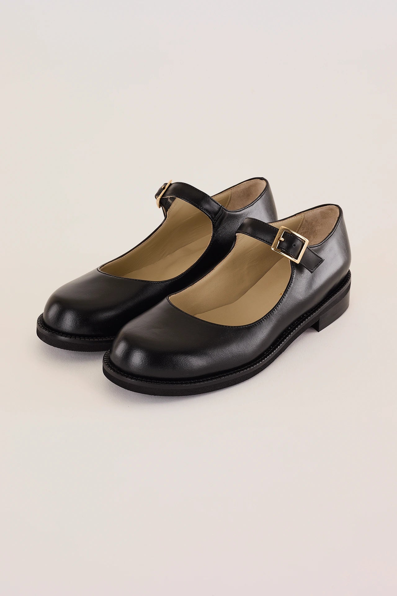 Round-toe Mary Janes with rubber sole