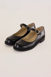 Round-toe Mary Janes with rubber sole