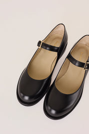 Round-toe Mary Janes with rubber sole