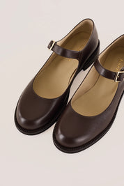 Round-toe Mary Janes with rubber sole