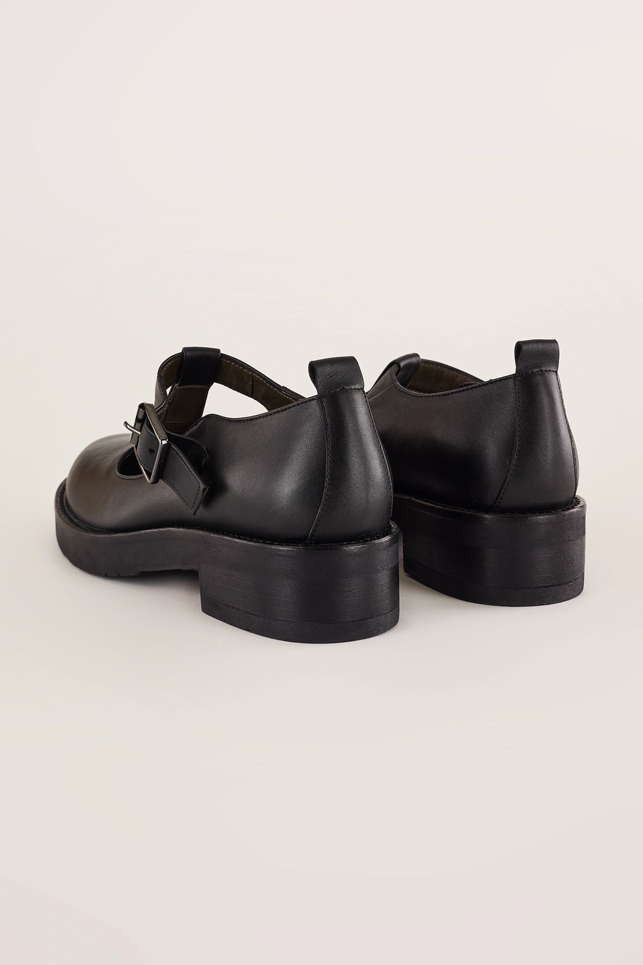 Scarpe t-bar con occhietti