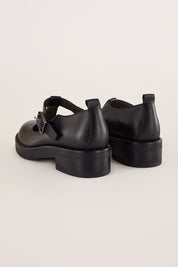 Scarpe t-bar con occhietti