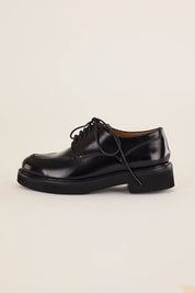 Scarpe stringate con suola alta in gomma