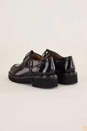 Scarpe stringate con suola alta in gomma