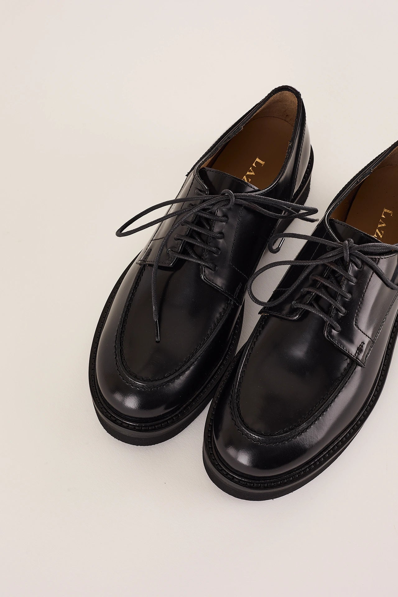 Scarpe stringate con suola alta in gomma