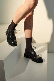 Scarpe stringate con suola alta in gomma