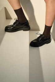 Scarpe stringate con suola alta in gomma