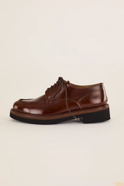 Scarpe stringate con suola alta in gomma