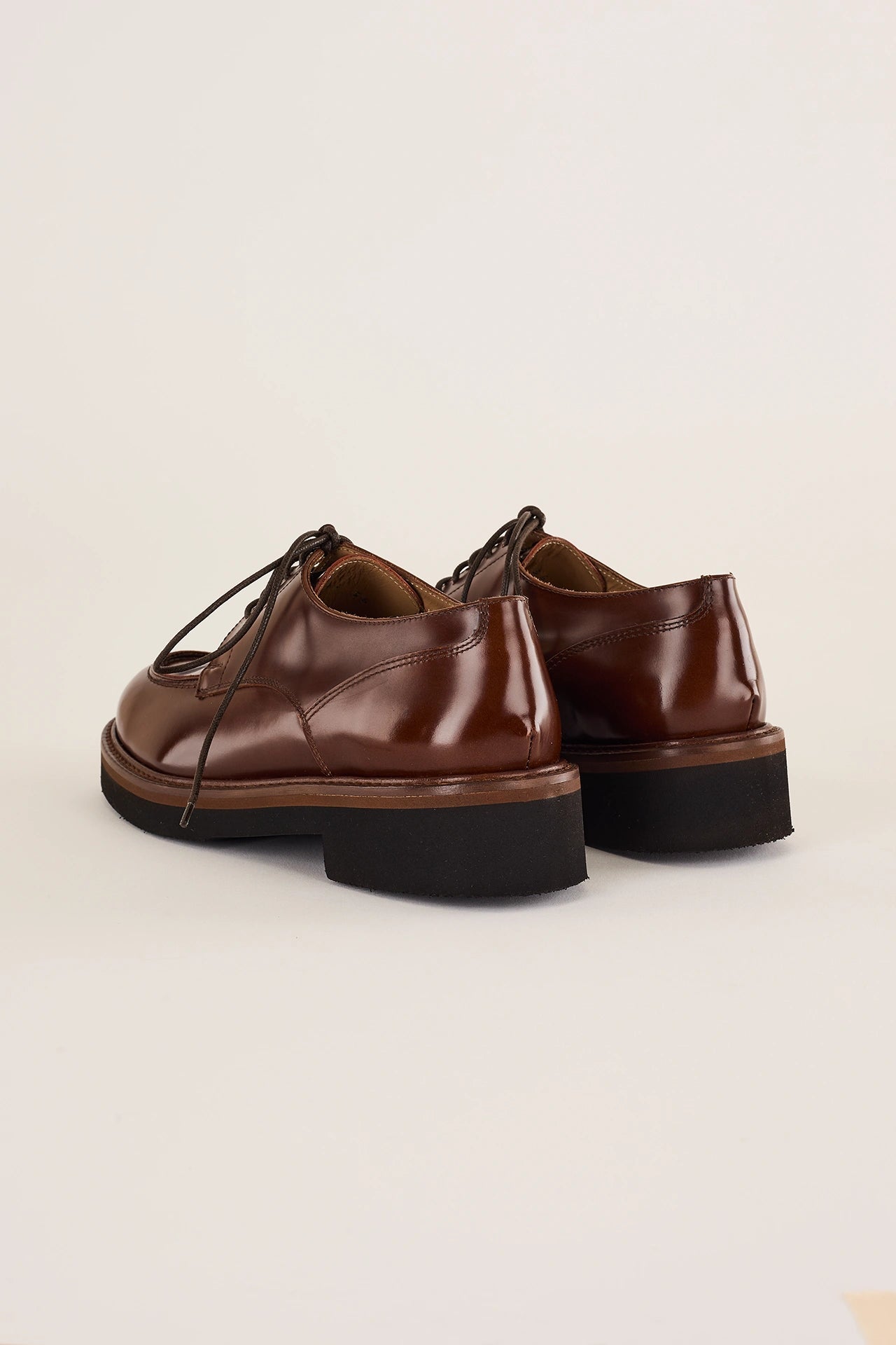 Scarpe stringate con suola alta in gomma
